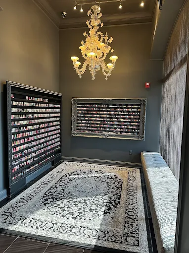 Ornate framed polish displays under crystal chandelier
